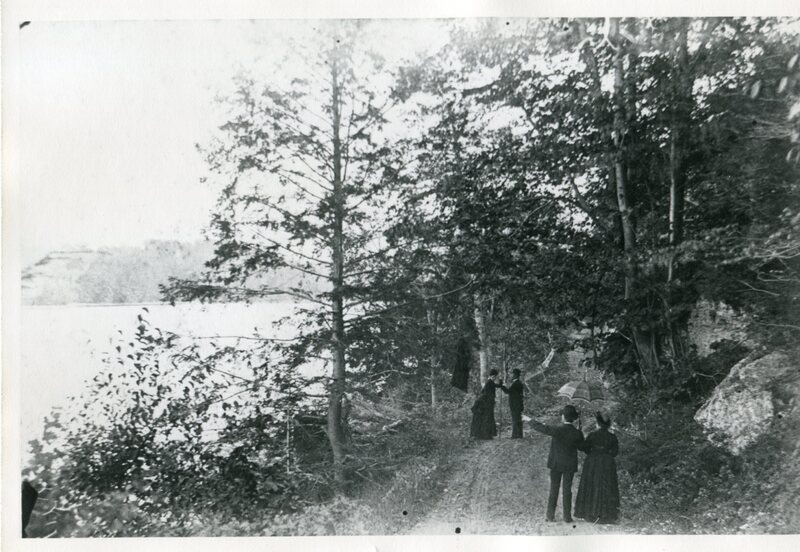 Couples strolling by Lake Quonnipaug