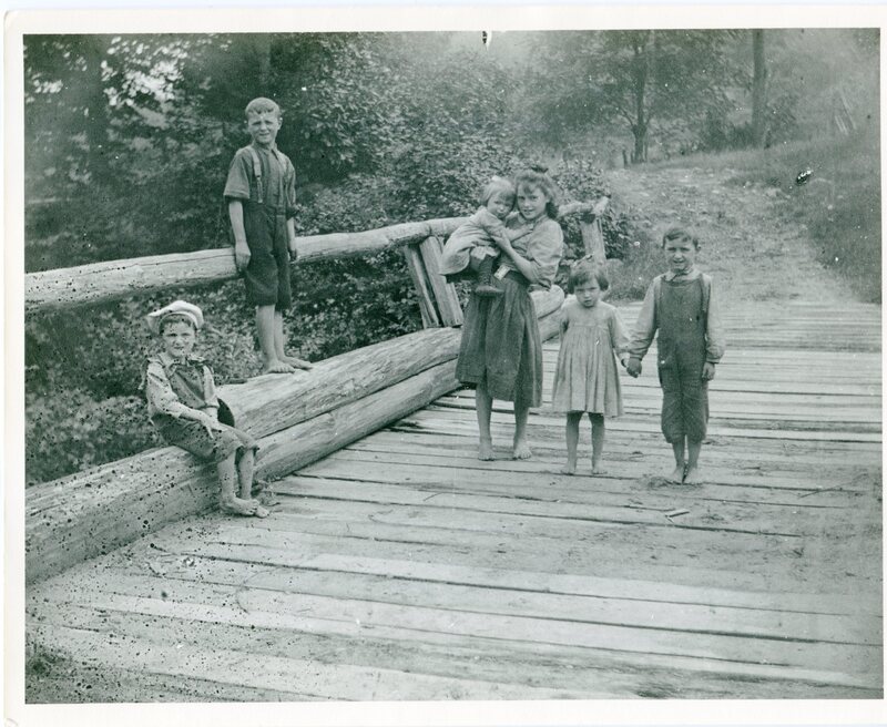 Six children on a bridge