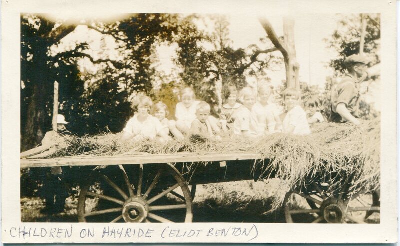 Children on hayride with Eliot Benton
