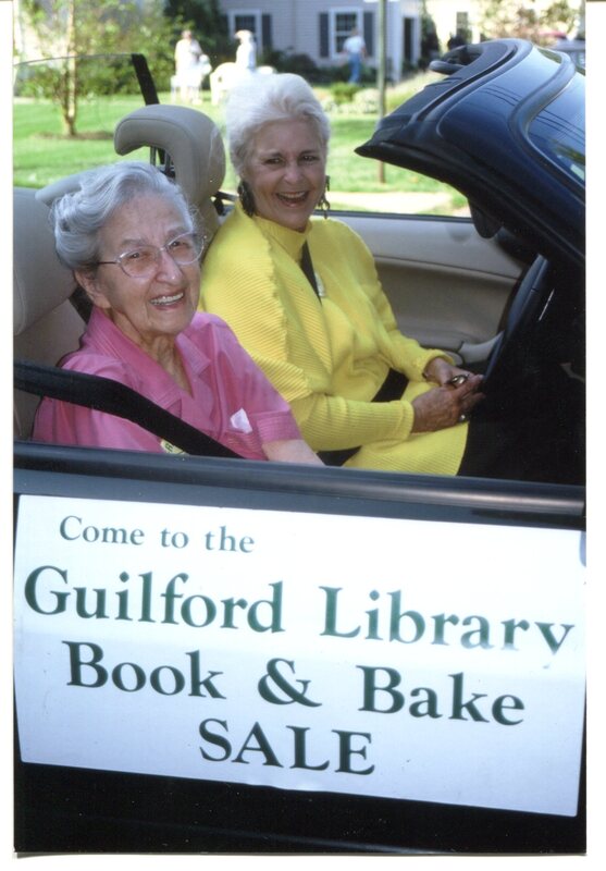 Edith B. Nettleton and Nancy Elderbaum promote the Library's Book and Bake Sale in the annual Guilford Fair Parade in 2003