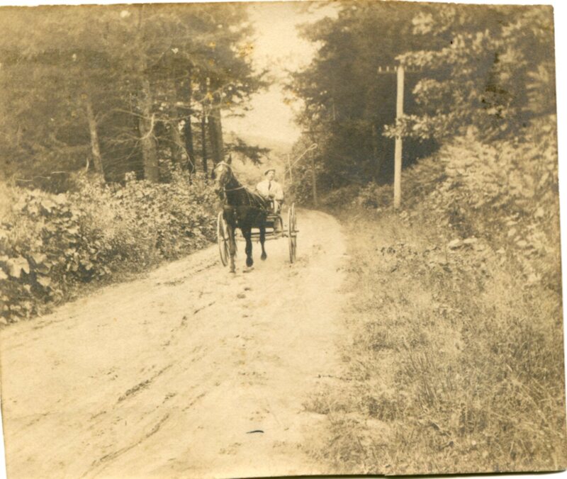 George T. Sperry drives his horse and buggy on Sachem's Head Road