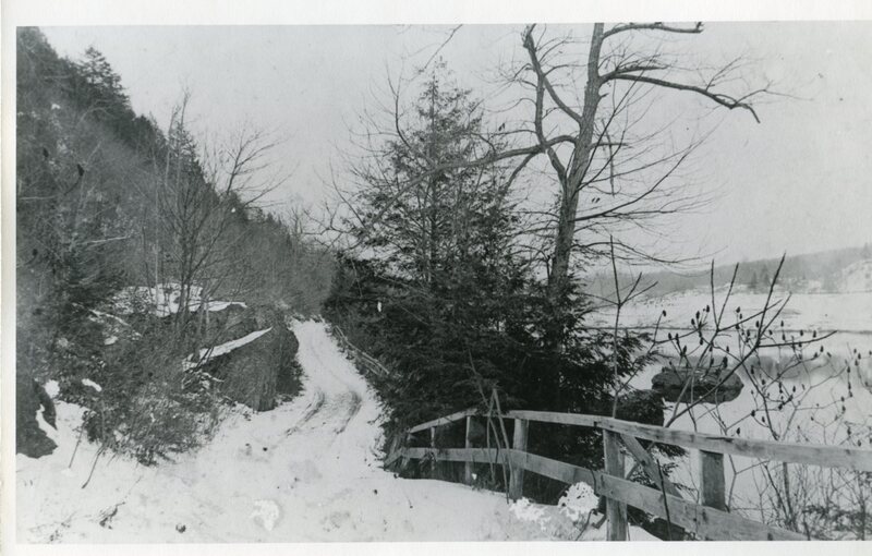 A snow-covered Rte 77 by Lake Quonnipaug