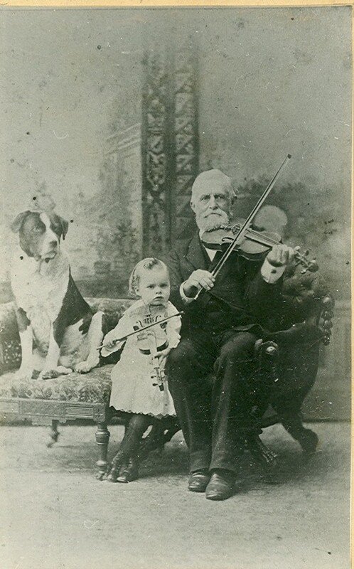 Captain Oliver Brooks with his grandson and dog
