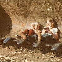 AmyandJennaOzyck_InBucketofBackhoe_ShattuckHouseRazed_June1978.jpg